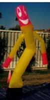 air puppet - 20ft tall yellow and pink air puppet