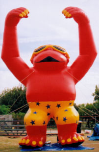 Giant Kong Balloons - gorilla cold-air advertising balloons. Great traffic builders for your sale or event. Cool Kong - 25ft. orange kong