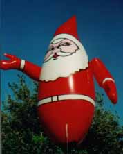 Christmas Helium Balloons - 11 ft. Santa helium balloon - great for small events and parades. Christmas helium balloon made in the USA.