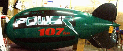 Radio station blimp - Power 107 FM logo