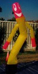Air balloon advertising - Big Balloons - Yellow pink dancing  guy balloon. Big balloons available for sale and rent!