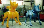 Product Replica of two mechanical dogs - all types of custom balloons available.