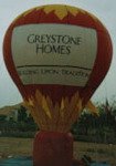 Giant Balloons - hot-air balloon shape cold-air advertising balloons. Great traffic builders for your sale or event.