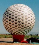Golf ball inflatables - giant 25ft. tall golfball balloons. Great traffic builders for your sale or event.