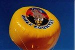 8' helium disk - advertising helium balloon with complex artwork - KMLE