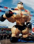Bodybuilder inflatables - giant bodybuilder balloon - INSTANT EVENTS - Rent an Event from us. Giant 35ft. Muscleman cold-air advertising balloons available.