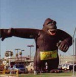 Advertising balloons - cold-air Kong inflatables in stock - custom banners and artwork available. Kongs and gorilla balloons are our most popular shapes! 40ft. brown Kong - HUGE!